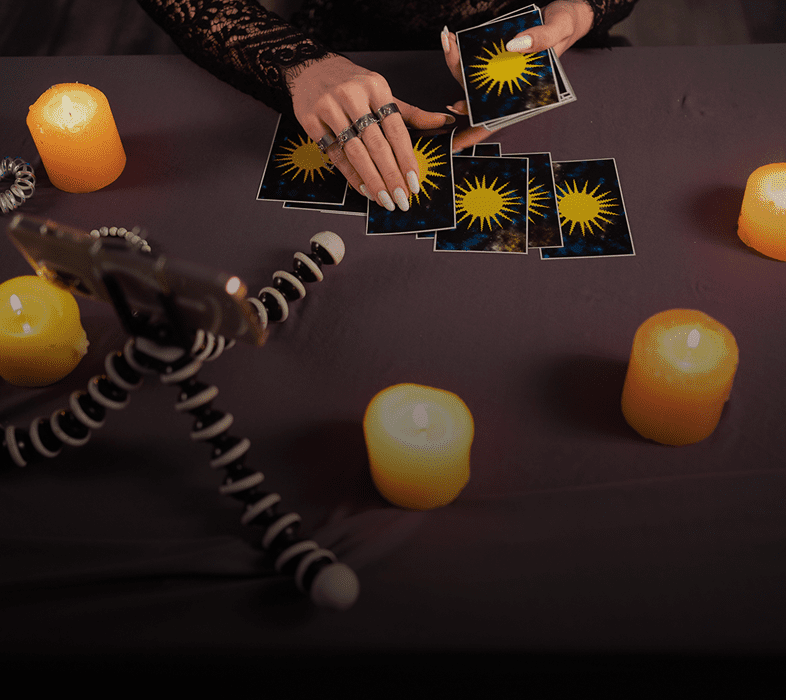 Tarot reading setup with lit candles